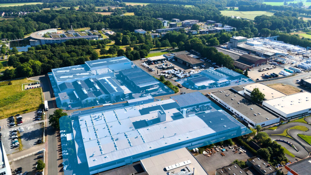 Vista aérea de las instalaciones de Spaleck GmbH & Co. KG en un entorno verde.